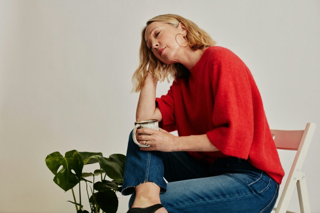 Sad woman sitting on a chair